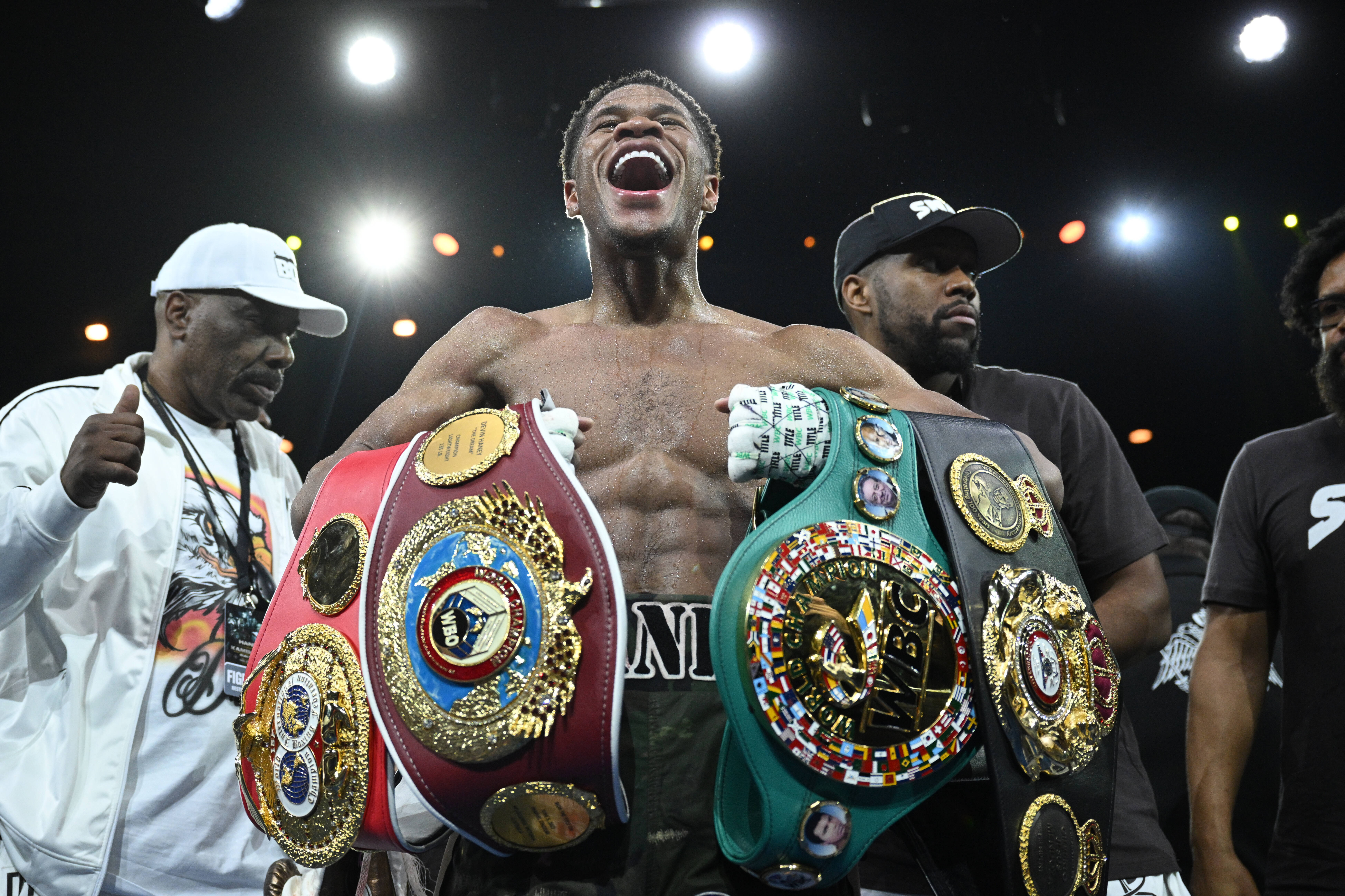 IMAGO/AAP. Devin Haney of the United States celebrates after winning the World Lightweight Title re-match between Devin Haney of the United States and Australia™s George Kambosos at Rod Laver Arena in Melbourne, Sunday, October 16, 2022.